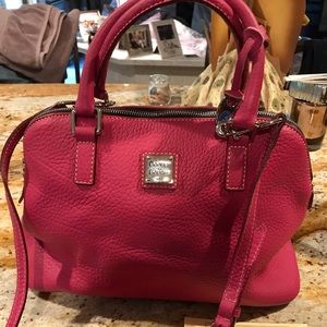 This is a Dooney and Bourke pink satchel.